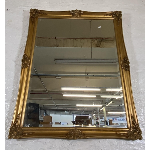 285 - A 19th century style gilt framed bevelled edge wall mirror - approx. 87cm high x 112cm wide