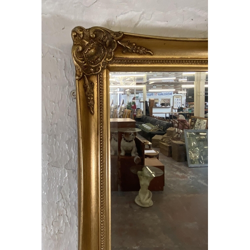 285 - A 19th century style gilt framed bevelled edge wall mirror - approx. 87cm high x 112cm wide