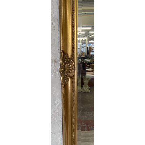 285 - A 19th century style gilt framed bevelled edge wall mirror - approx. 87cm high x 112cm wide