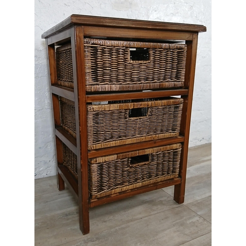 101 - A hardwood and wicker chest of drawers - approx. 79cm high x 54cm wide x 45cm deep