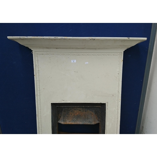 102 - A Victorian style cast iron fire surround - approx. 132cm high x 99cm wide x 18cm deep