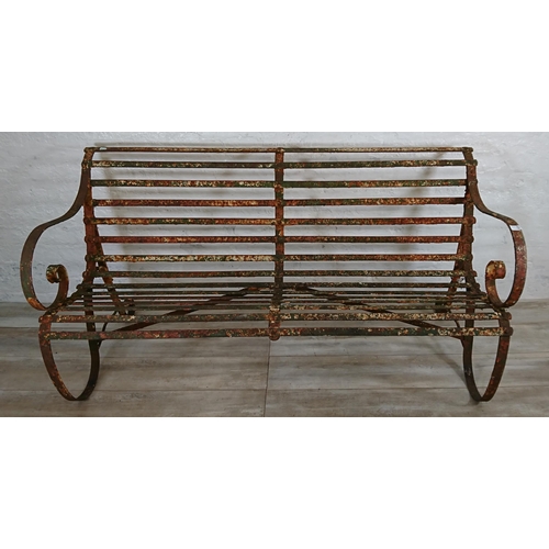 104A - A 19th century wrought iron strap work garden bench - approx. 82cm high x 150cm wide x 70cm deep