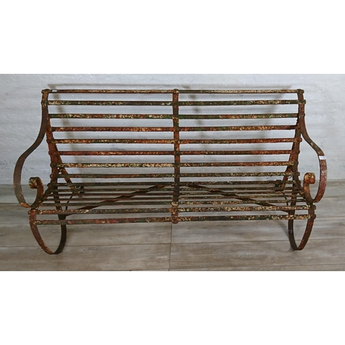 104A - A 19th century wrought iron strap work garden bench - approx. 82cm high x 150cm wide x 70cm deep