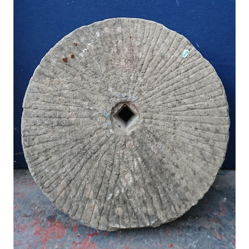 104B - A cast stone grinding wheel - approx. 60cm diameter