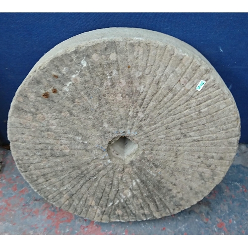 104B - A cast stone grinding wheel - approx. 60cm diameter