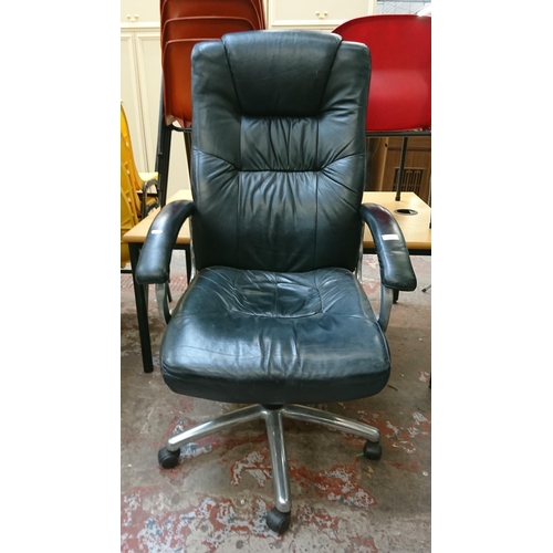 110 - A black leather adjustable swivel desk chair - approx. 117cm high x 67cm wide