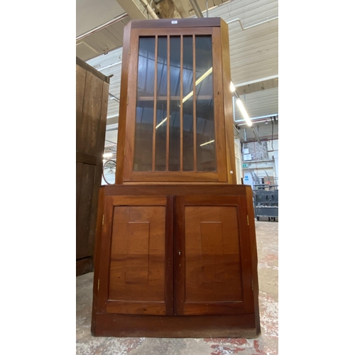 132 - A mahogany free standing corner display cabinet - approx. 186cm high