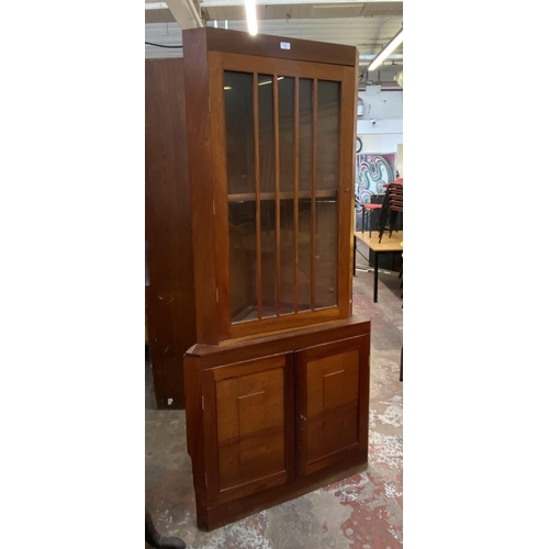 132 - A mahogany free standing corner display cabinet - approx. 186cm high