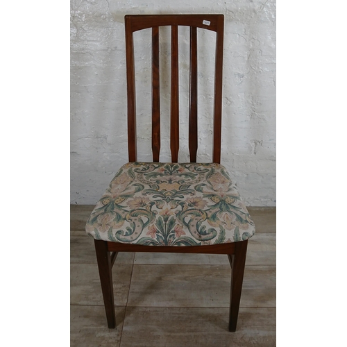 136 - Four mid 20th century William Lawrence teak and fabric upholstered dining chairs