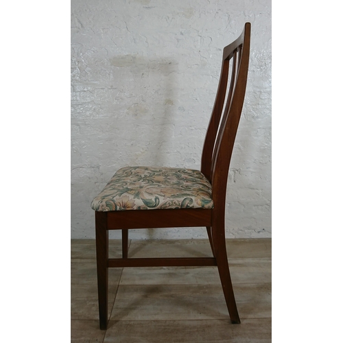 136 - Four mid 20th century William Lawrence teak and fabric upholstered dining chairs