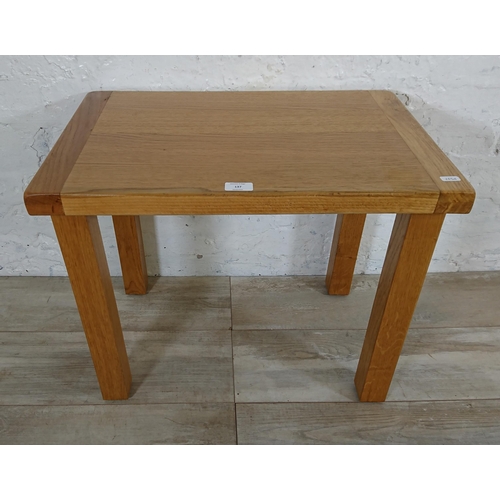 137 - A Sherbourne oak side table - approx. 48cm high x 60cm wide x 40cm deep