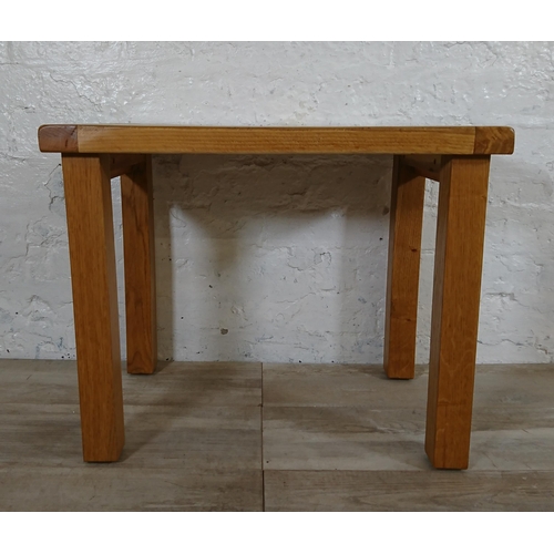 137 - A Sherbourne oak side table - approx. 48cm high x 60cm wide x 40cm deep