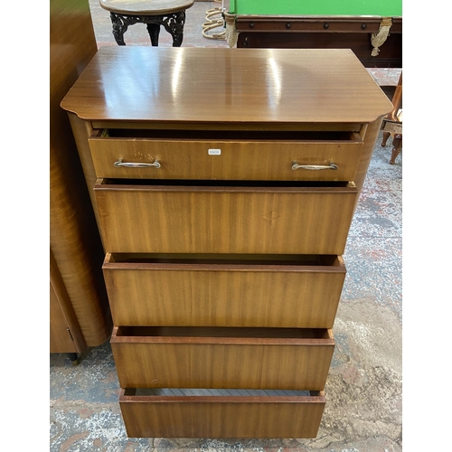 141 - A mid 20th century Homeworthy teak two piece bedroom suite comprising chest of drawers - approx. 106... 