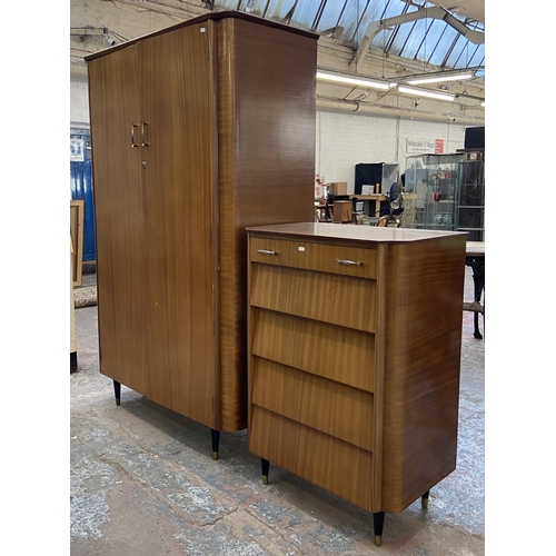 141 - A mid 20th century Homeworthy teak two piece bedroom suite comprising chest of drawers - approx. 106... 