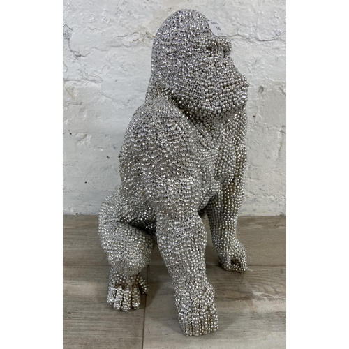 148 - A Kare Design silver jewelled resin gorilla sculpture - approx. 43cm high