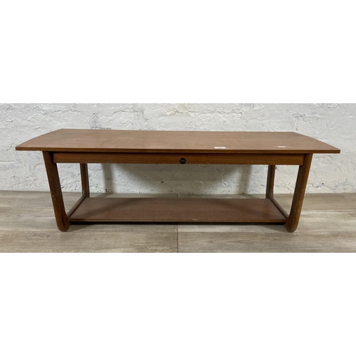 149 - A Myer teak coffee table - approx. 34cm high x 38cm wide x 107cm deep