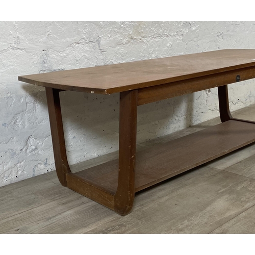 149 - A Myer teak coffee table - approx. 34cm high x 38cm wide x 107cm deep