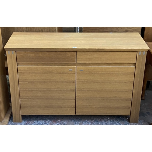 150 - A modern oak sideboard - approx. 90cm high x 140cm wide x 47cm deep