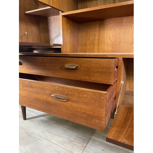 18 - A mid 20th century G Plan Brasilia teak highboard - approx. 136cm high x 152cm wide x 44cm deep