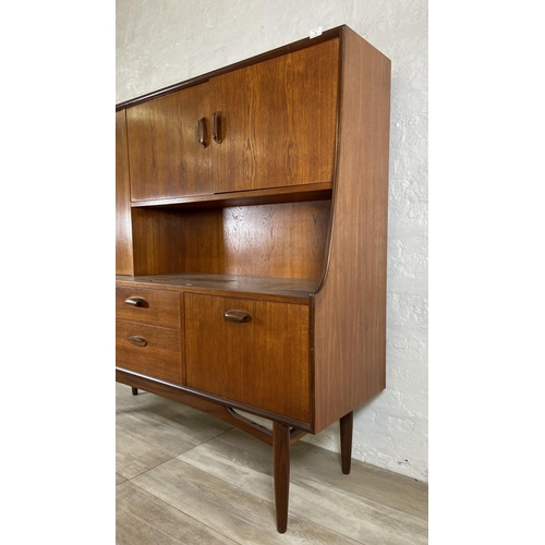 18 - A mid 20th century G Plan Brasilia teak highboard - approx. 136cm high x 152cm wide x 44cm deep