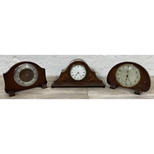 19 - Three mantel clocks, one Edwardian inlaid oak cased with white enamel face, one 1930s Smiths walnut ... 