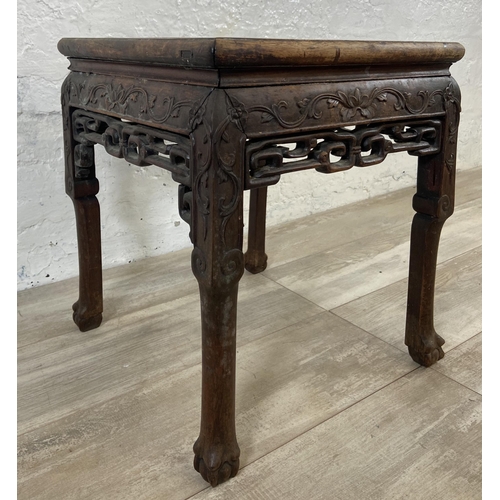 2 - A Chinese carved hardwood and marble side table - approx. 48cm high x 42cm wide x 42cm deep