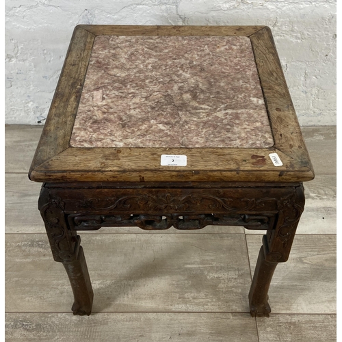 2 - A Chinese carved hardwood and marble side table - approx. 48cm high x 42cm wide x 42cm deep