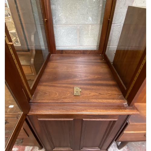 20 - A mahogany display cabinet - approx. 210cm high x 73cm wide x 70cm deep