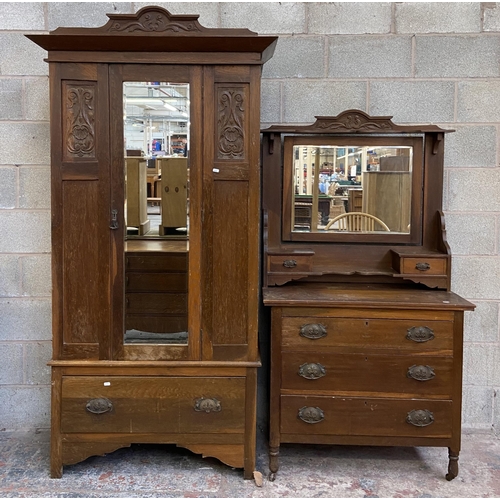 21 - A late Victorian carved oak two piece bedroom suite comprising dressing chest with upper bevelled ed... 