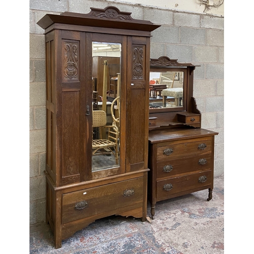 21 - A late Victorian carved oak two piece bedroom suite comprising dressing chest with upper bevelled ed... 