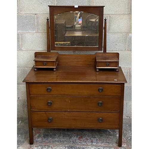 25 - An Edwardian mahogany dressing chest with upper bevelled edge mirror - approx. 151cm high x 107cm wi... 