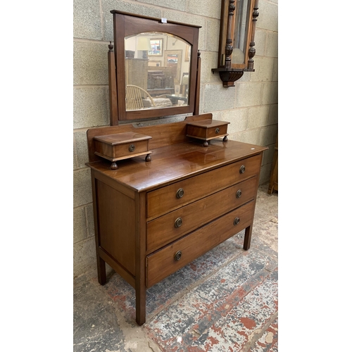 25 - An Edwardian mahogany dressing chest with upper bevelled edge mirror - approx. 151cm high x 107cm wi... 