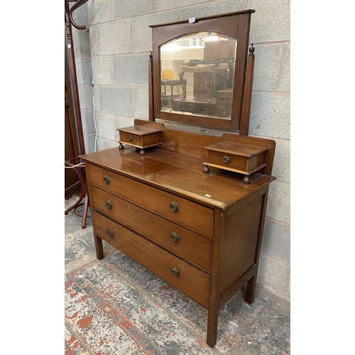 25 - An Edwardian mahogany dressing chest with upper bevelled edge mirror - approx. 151cm high x 107cm wi... 