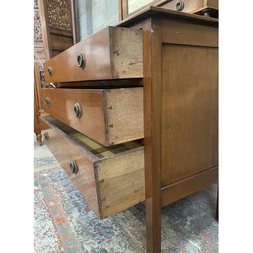 25 - An Edwardian mahogany dressing chest with upper bevelled edge mirror - approx. 151cm high x 107cm wi... 