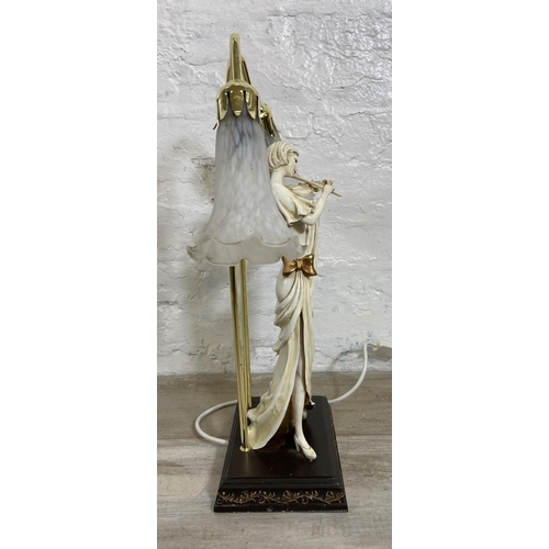 26 - A resin violin player figural table lamp with two mottled glass shades - approx. 52cm high