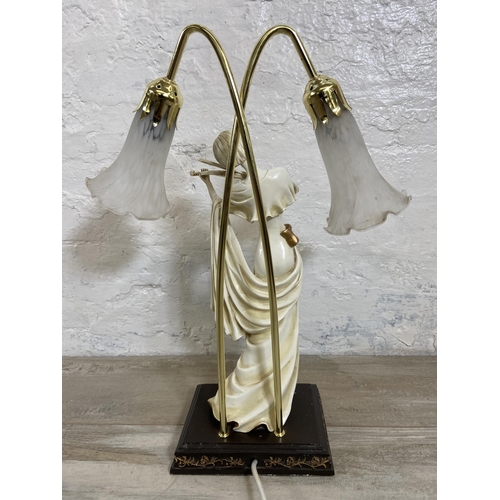 26 - A resin violin player figural table lamp with two mottled glass shades - approx. 52cm high