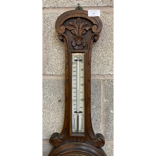 27 - A Victorian carved oak cased barometer - approx. 80cm high