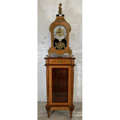 28 - An Italian Le Ore inlaid walnut effect and gilt metal chiming table clock and display cabinet - cloc... 