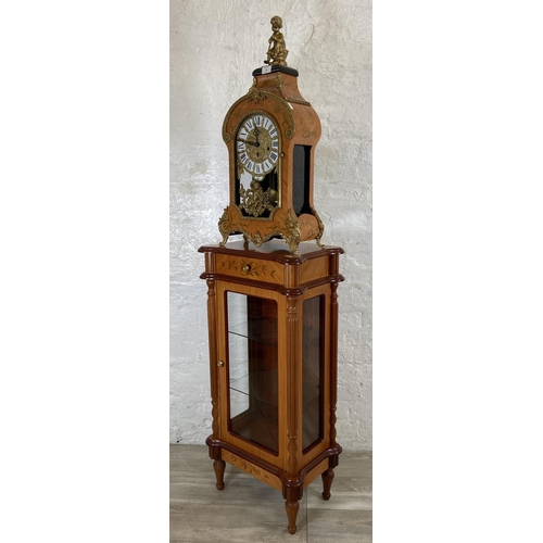 28 - An Italian Le Ore inlaid walnut effect and gilt metal chiming table clock and display cabinet - cloc... 