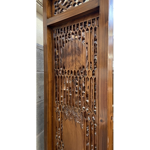 30 - A Chinese carved hardwood four section folding room divider/screen - approx. 256cm high x 172cm wide