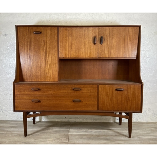 33 - A mid 20th century G Plan Brasilia teak highboard - approx. 136cm high x 152cm wide x 44cm deep