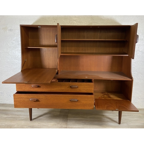 33 - A mid 20th century G Plan Brasilia teak highboard - approx. 136cm high x 152cm wide x 44cm deep