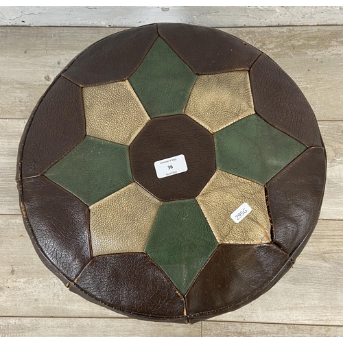 36 - A mid 20th century Moroccan brown, cream and green leather circular footstool - approx. 26cm high x ... 