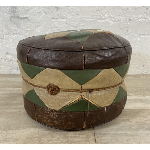 36 - A mid 20th century Moroccan brown, cream and green leather circular footstool - approx. 26cm high x ... 