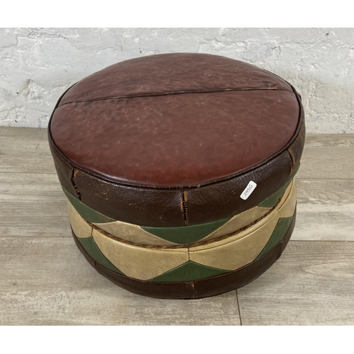 36 - A mid 20th century Moroccan brown, cream and green leather circular footstool - approx. 26cm high x ... 