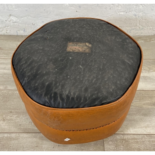 37 - A mid 20th century Miss Muffet orange and cream vinyl footstool - approx. 28cm high x 42cm diameter