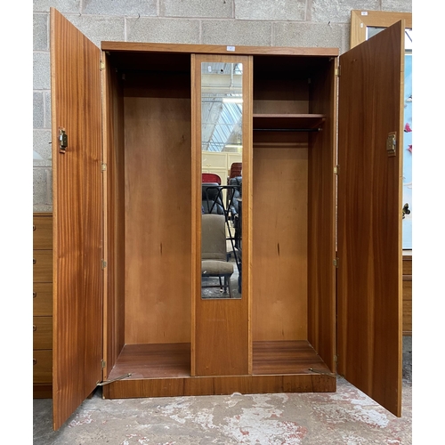 39 - A mid 20th century teak double wardrobe with central mirror - approx. 172cm high x 115cm wide x 50cm... 