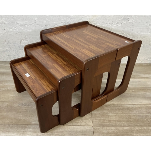 46 - A mid 20th century teak and melamine nest of three tables - approx. 46cm high x 55cm wide x 48cm dee... 