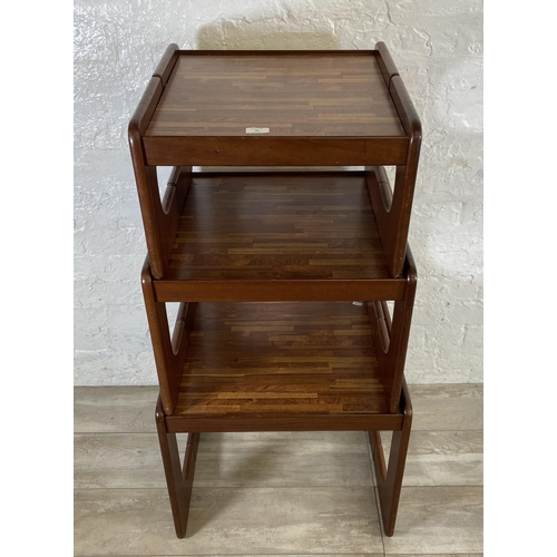 46 - A mid 20th century teak and melamine nest of three tables - approx. 46cm high x 55cm wide x 48cm dee... 