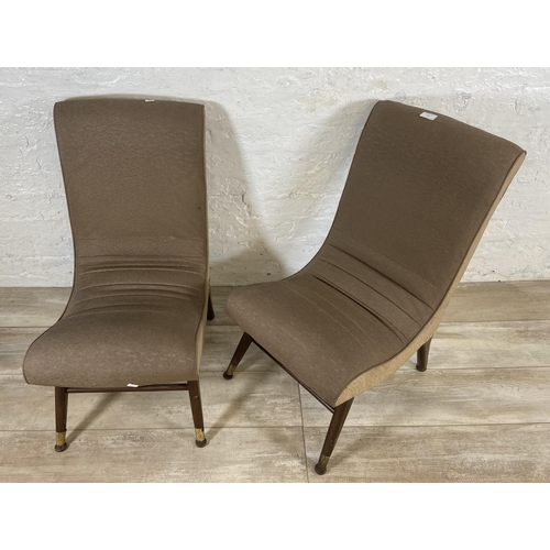 47 - A pair of mid 20th century brown vinyl bedroom chairs on beech supports